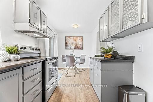 Townhouse for sale at 92-900 Central Park Drive, Brampton, Ontario, L6S 3J6 - Northgate - MLS: W12932368