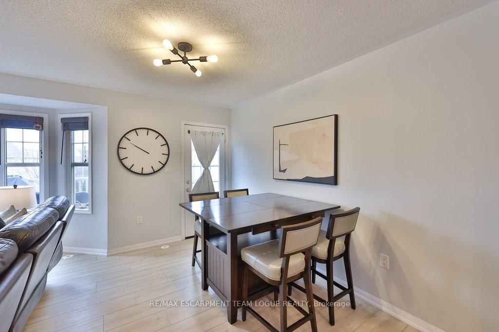 Townhouse for sale at 653 Speyer Circle, Milton, Ontario, L9T 0Y5 - Harrison - MLS: W12953446