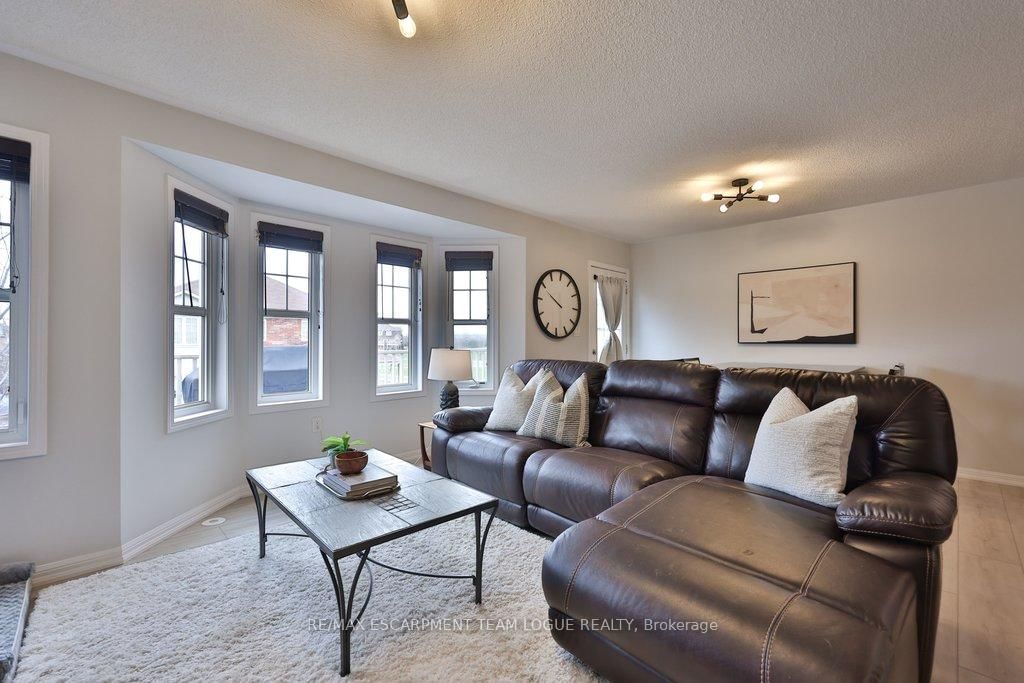 Townhouse for sale at 653 Speyer Circle, Milton, Ontario, L9T 0Y5 - Harrison - MLS: W12953446