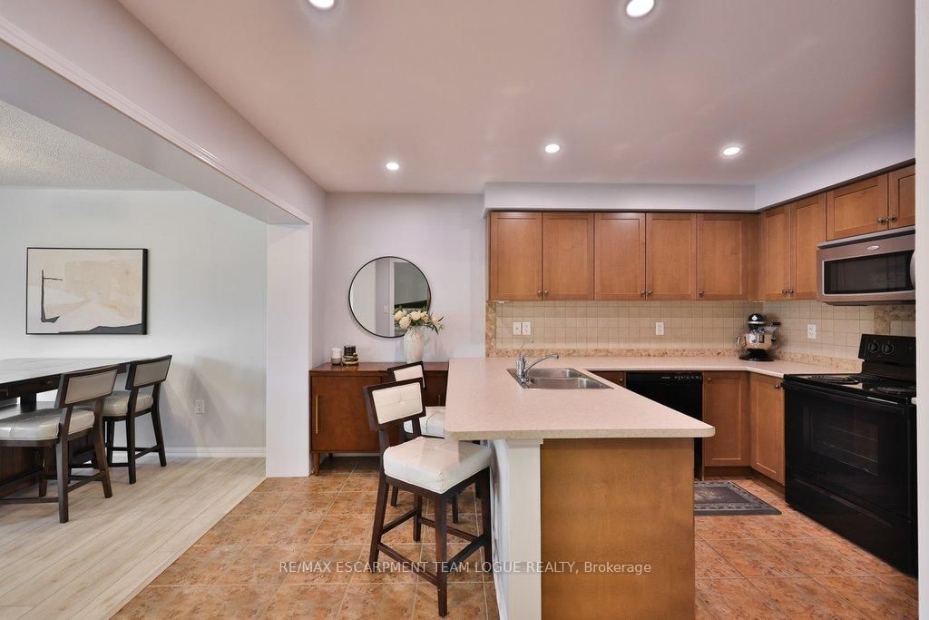 Townhouse for sale at 653 Speyer Circle, Milton, Ontario, L9T 0Y5 - Harrison - MLS: W12953446