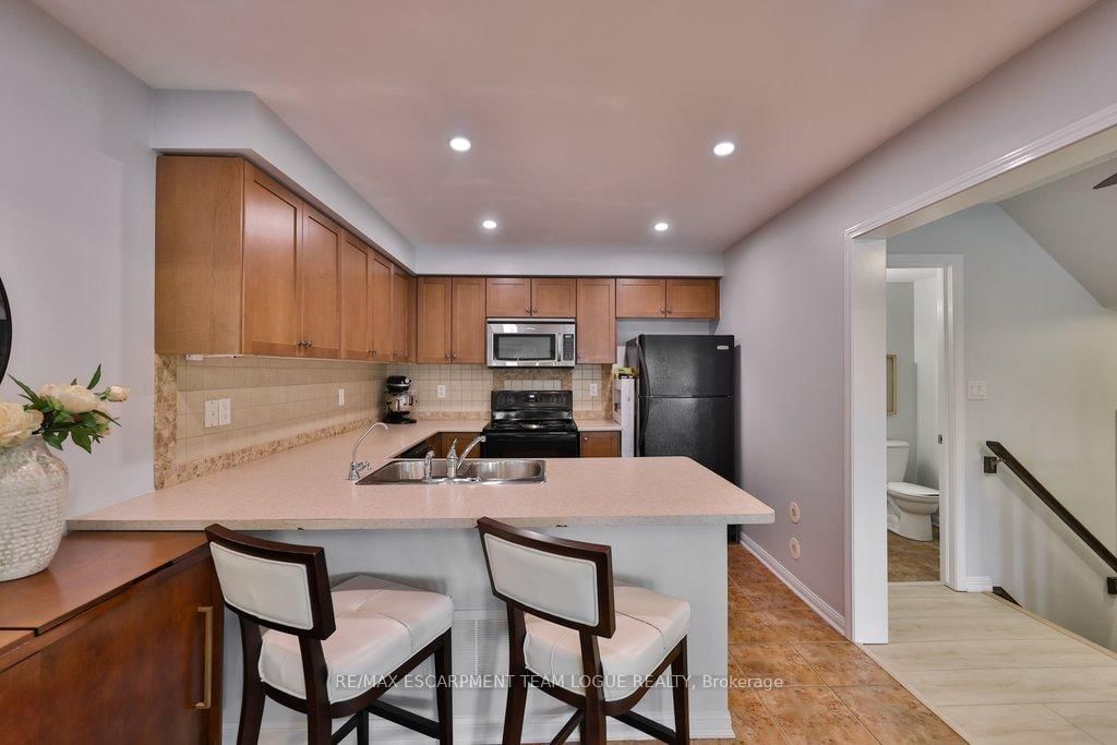 Townhouse for sale at 653 Speyer Circle, Milton, Ontario, L9T 0Y5 - Harrison - MLS: W12953446