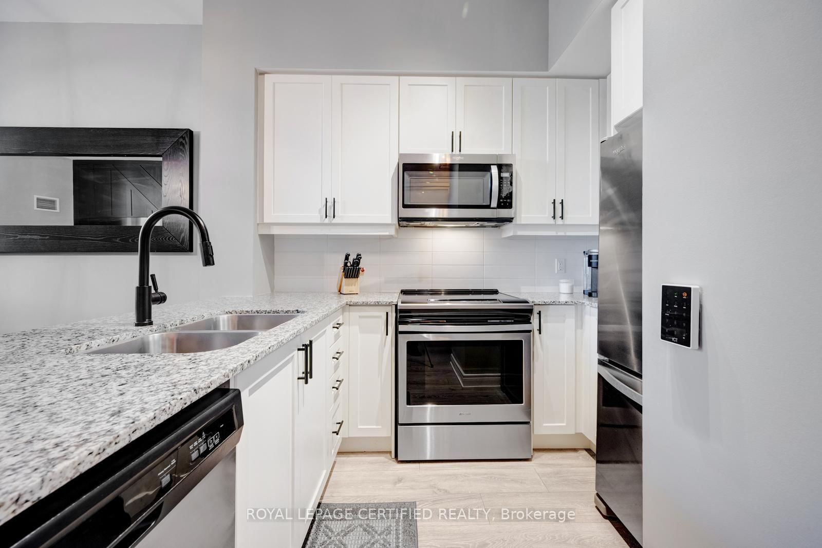 Condo for sale at 114-1050 Main Street, Milton, Ontario, L9T 9M3 - Dempsey - MLS: W12996782