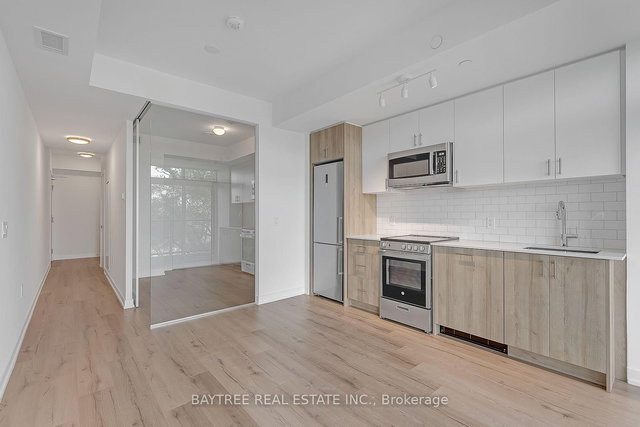 319 - 1195 The Queensway