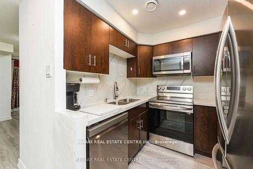 7405 Goreway Drive, Unit 520 - Photo 32
