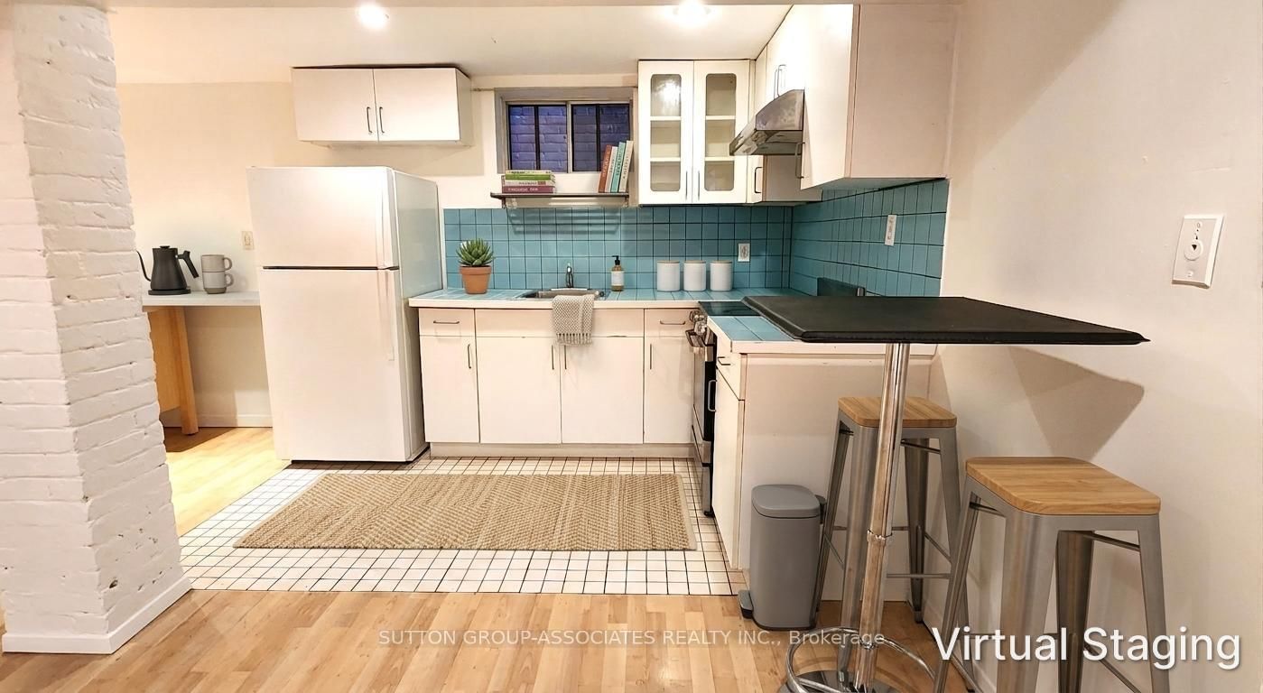 360 Sorauren Avenue, Unit BSMT - Photo 10