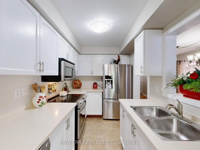 16 - 7360 Zinnia Place
