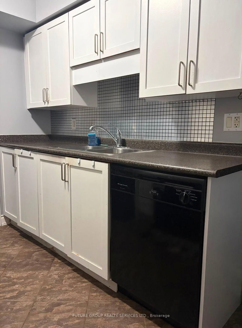 2 - 613 Dundas Street W