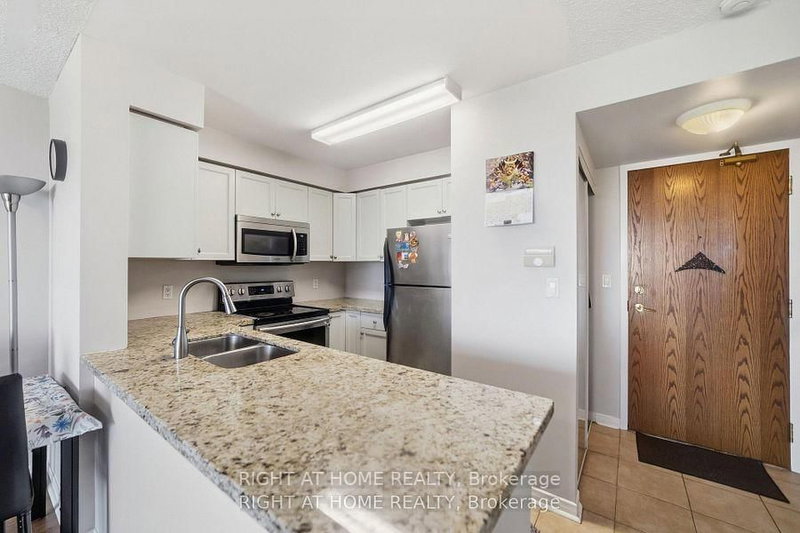 4879 KIMBERMOUNT Ave photo 4