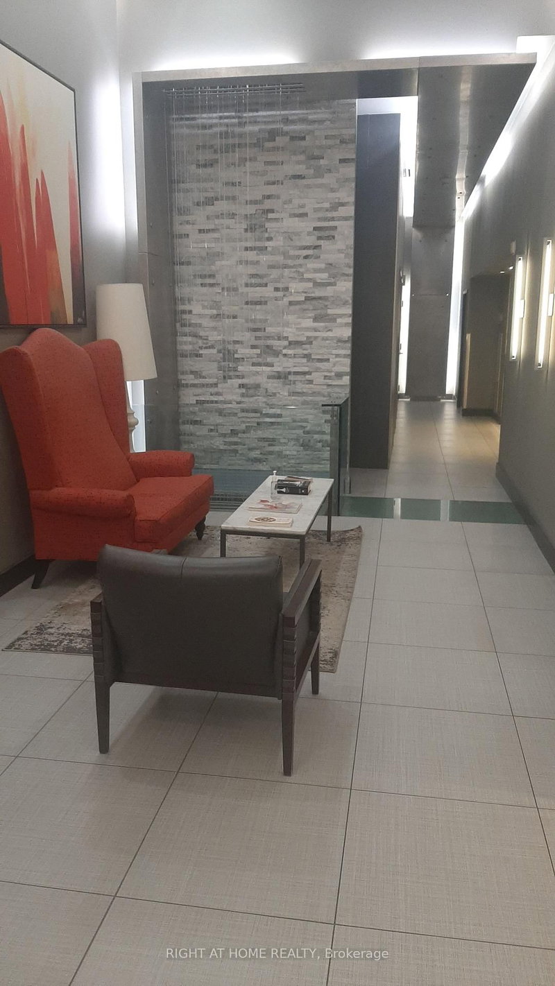 205 - 1040 The Queensway