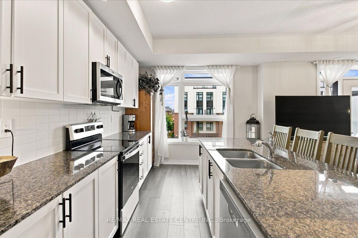 1597 Rose Way • #103 • Milton, ON photo 10
