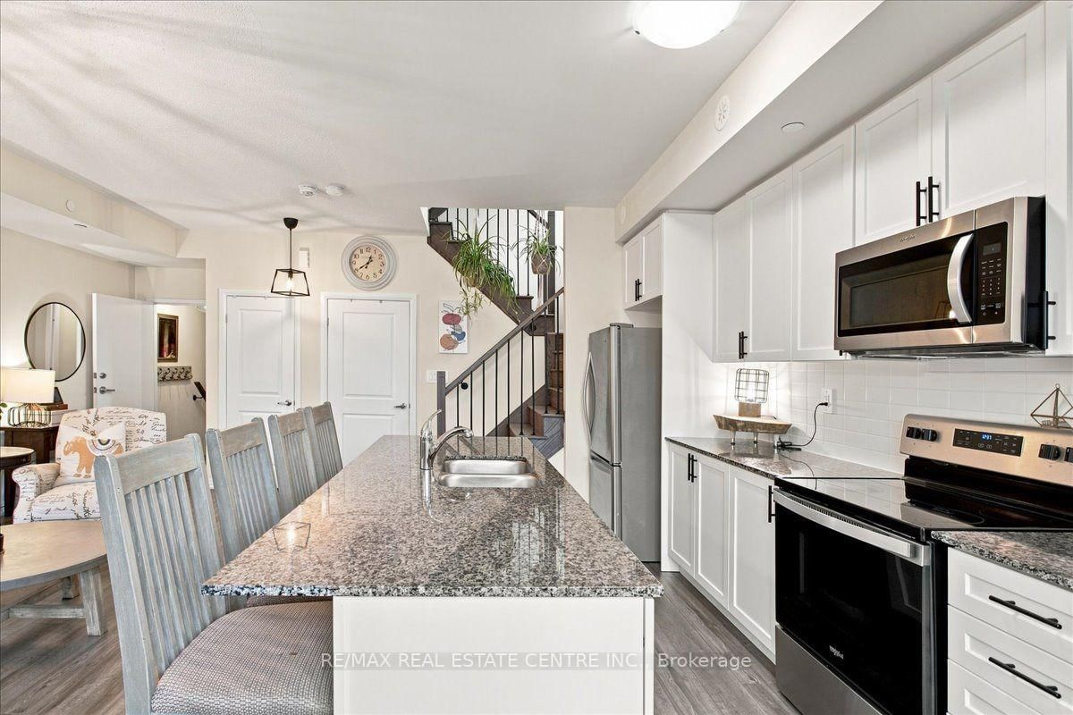 1597 Rose Way • #103 • Milton, ON photo 6