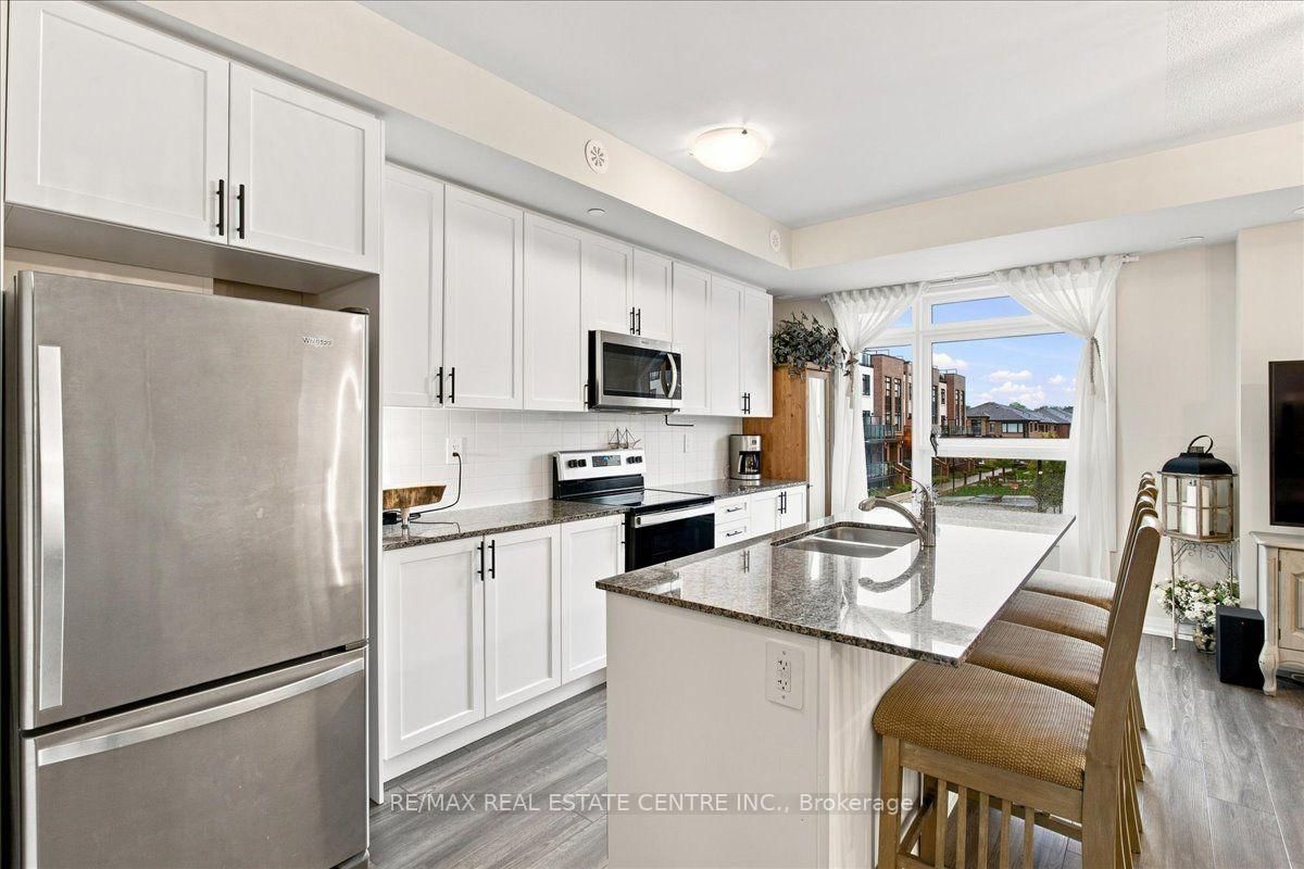 1597 Rose Way • #103 • Milton, ON photo 8