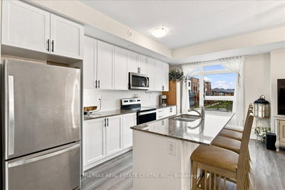1597 Rose Way • #103 • Milton, ON photo 8