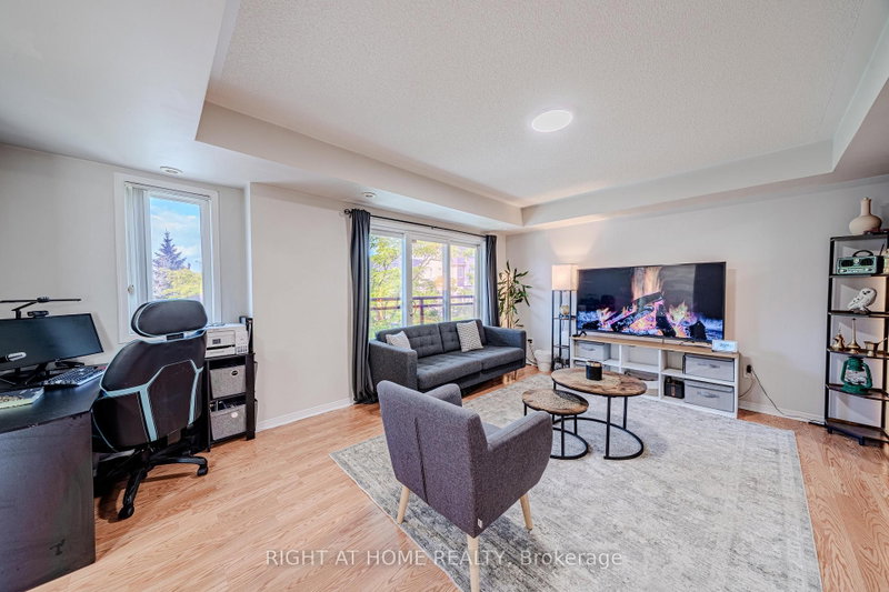 100 - 5035 Oscar Peterson Boulevard N