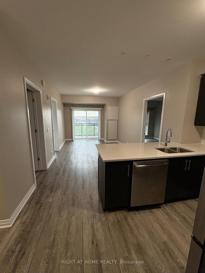 128 Grovewood Common • #405 • Oakville, ON photo 2