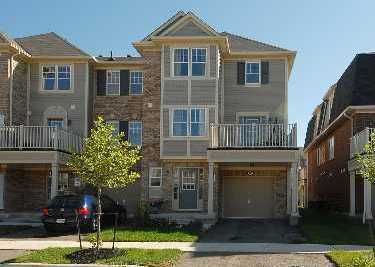 Townhouse sold at 925 Burrows Gate, Milton, Ontario, L9T0K7 - Coates - MLS: W1780863