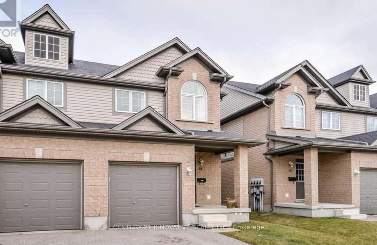 Townhouse for sale at 34 Revell Drive, Guelph, Hanlon Industrial, N1G 0B8 - MLS: X11994285