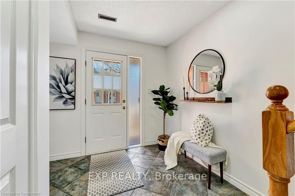 Townhouse sold at 22-89 Woolwich Street, Waterloo, N2K 1S5 - MLS: X12040318