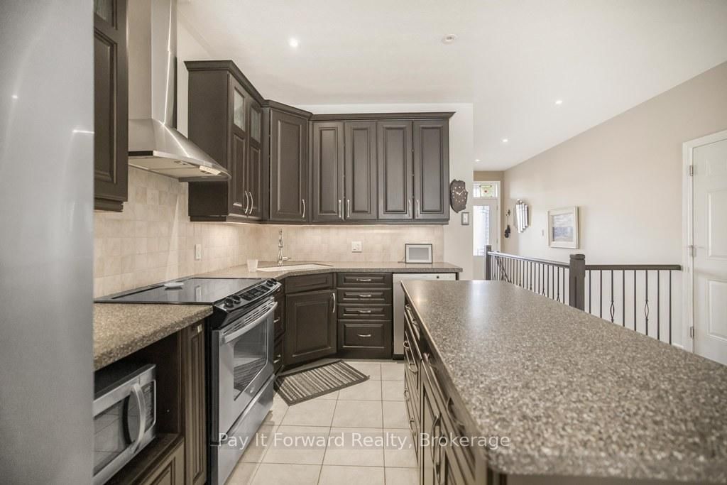 Townhouse sold at 2-244 Dundas Street, Brant, Paris, N3L 0B4 - MLS: X12081896