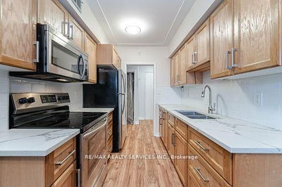 Unit 203 — 11 Woodman Dr, Hamilton - Corman image-0-3