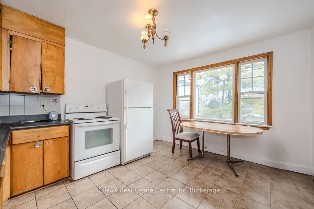 Detached House sold at 113 Elizabeth Street, Guelph, St. Patrick's Ward, N1E 2X4 - MLS: X12102480