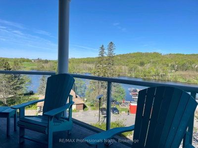 Condo sold at 300-25 Pen Lake Point Road, Huntsville, Ontario, P1H 1A9 - Chaffey - MLS: X12165528