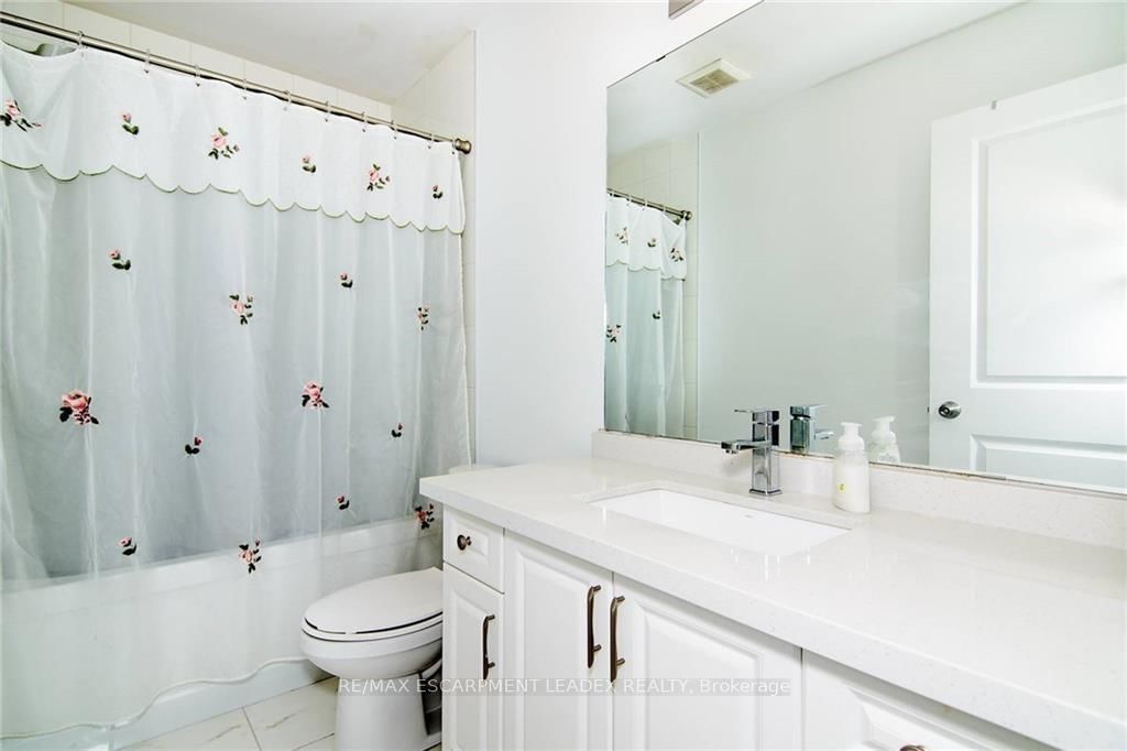 Townhouse for lease at 14 Cleland Avenue, Hamilton, Ontario, L9K 0J9 - Meadowlands - MLS: X12552810