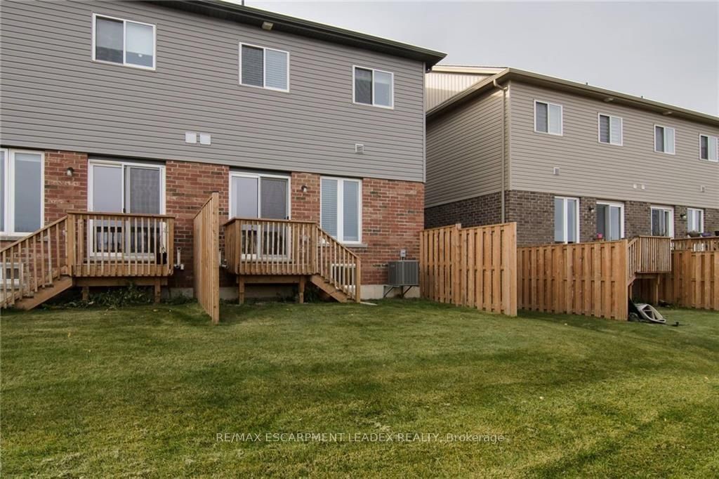 Townhouse for lease at 14 Cleland Avenue, Hamilton, Ontario, L9K 0J9 - Meadowlands - MLS: X12552810