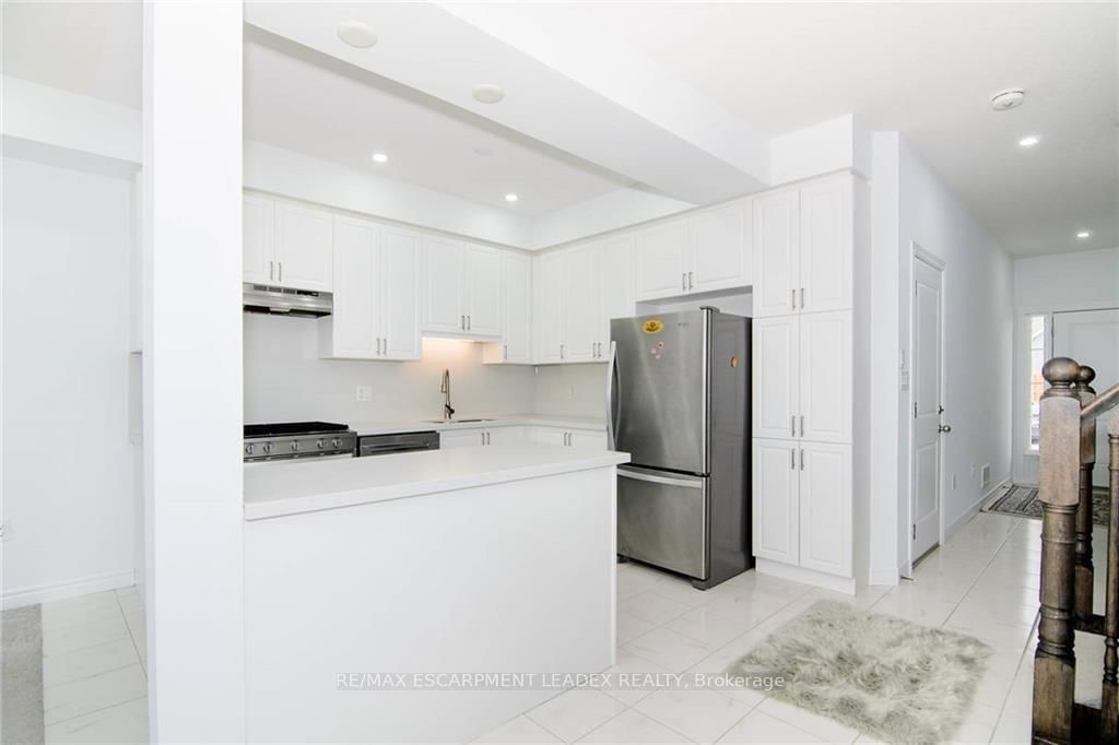 Townhouse for lease at 14 Cleland Avenue, Hamilton, Ontario, L9K 0J9 - Meadowlands - MLS: X12552810