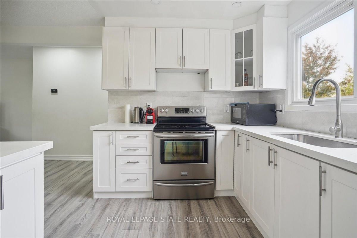 Townhouse for sale at 12-36 Greendale Drive, Hamilton, Ontario, L9C 5Z4 - Gurnett - MLS: X12556028