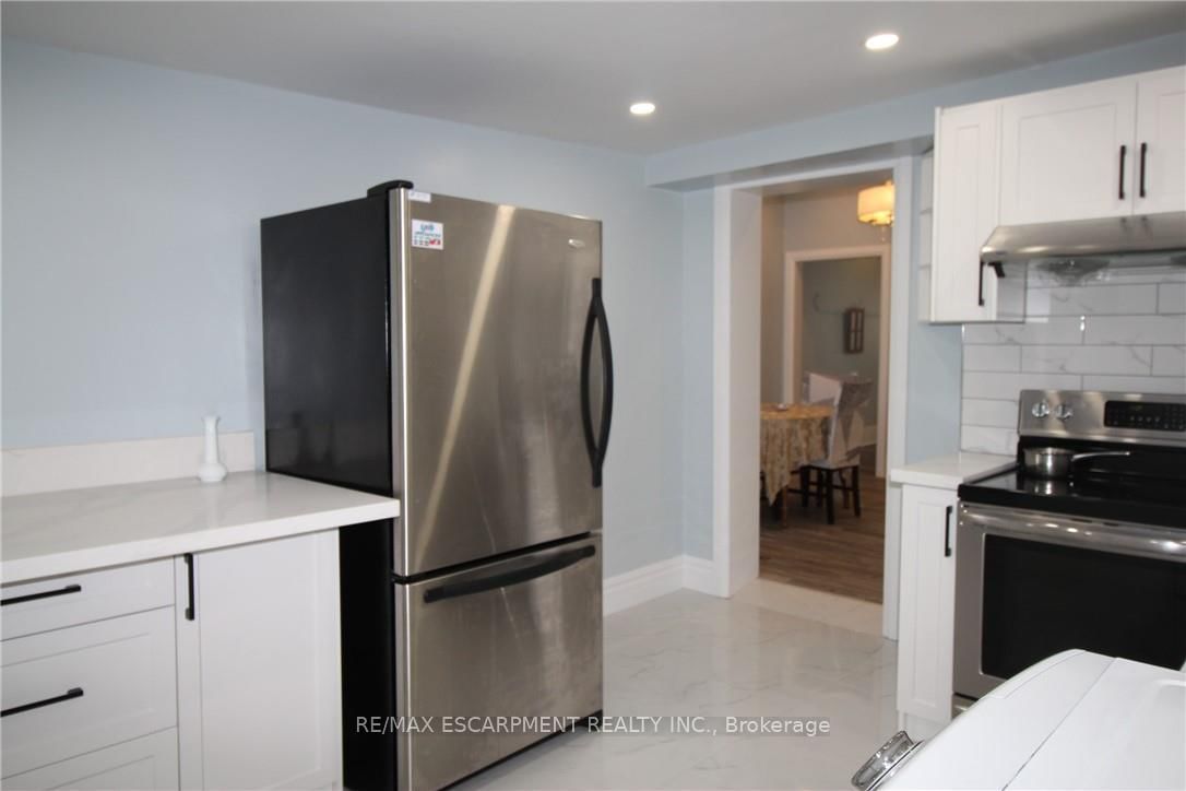 Townhouse for sale at 19 Emerald Street, Hamilton, Ontario, L8L 5J9 - Landsdale - MLS: X12674590