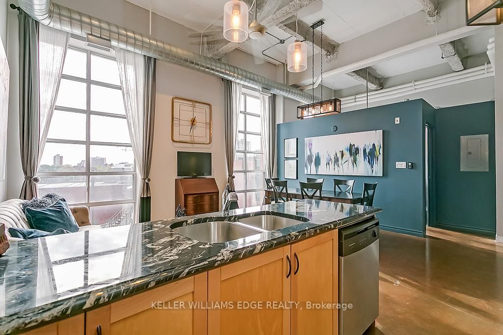 Condo for sale at 311-11 Rebecca Street, Hamilton, Ontario, L8R 3H7 - Beasley - MLS: X12739346