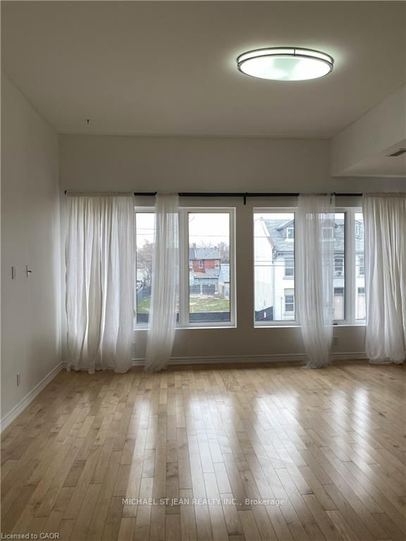 Condo for lease at 201-130 Wellington Street, Hamilton, Ontario, L8R 1N3 - Landsdale - MLS: X12751200