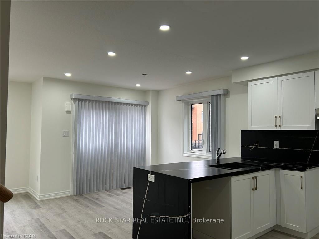 Townhouse for sale at 73 Dryden Lane, Hamilton, Ontario, L8H 0B6 - McQuesten - MLS: X12812208