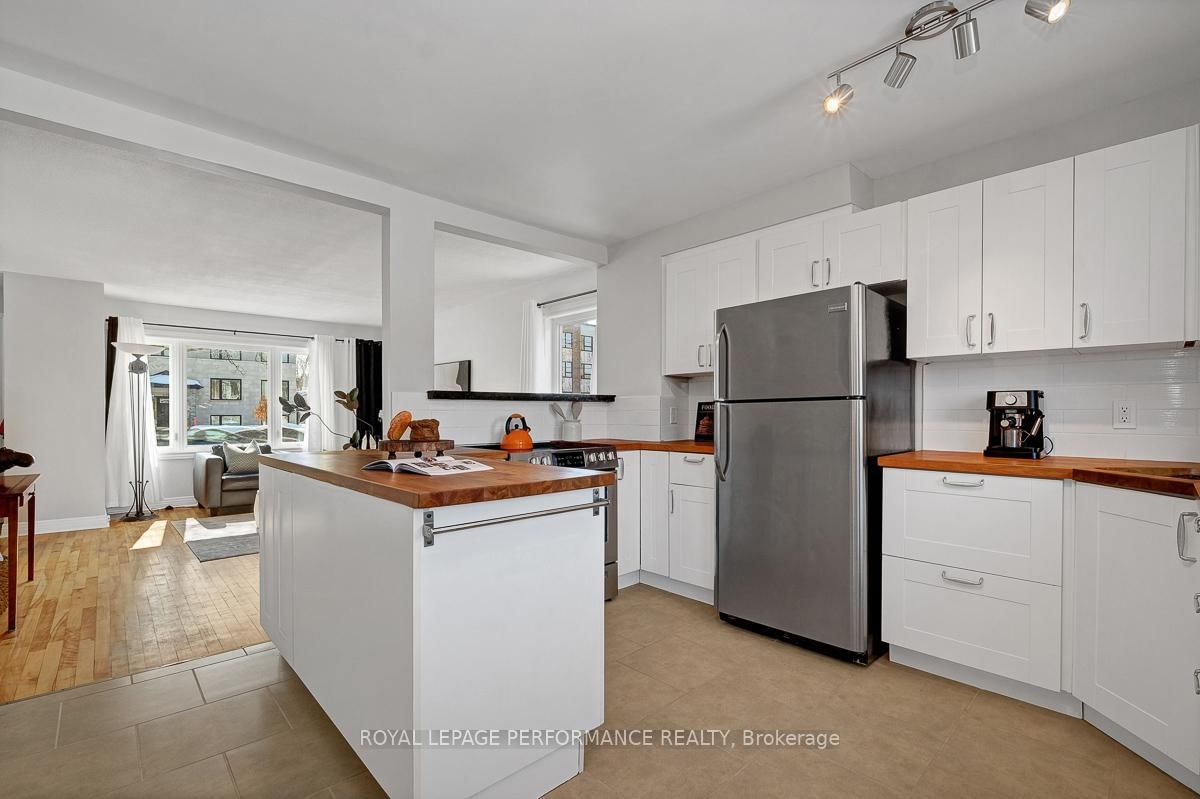 Semi-Detached House for sale at 321 Donald Street, Ottawa, Ontario, K1K 1M4 - Overbrook/Castle Heights - MLS: X12850072