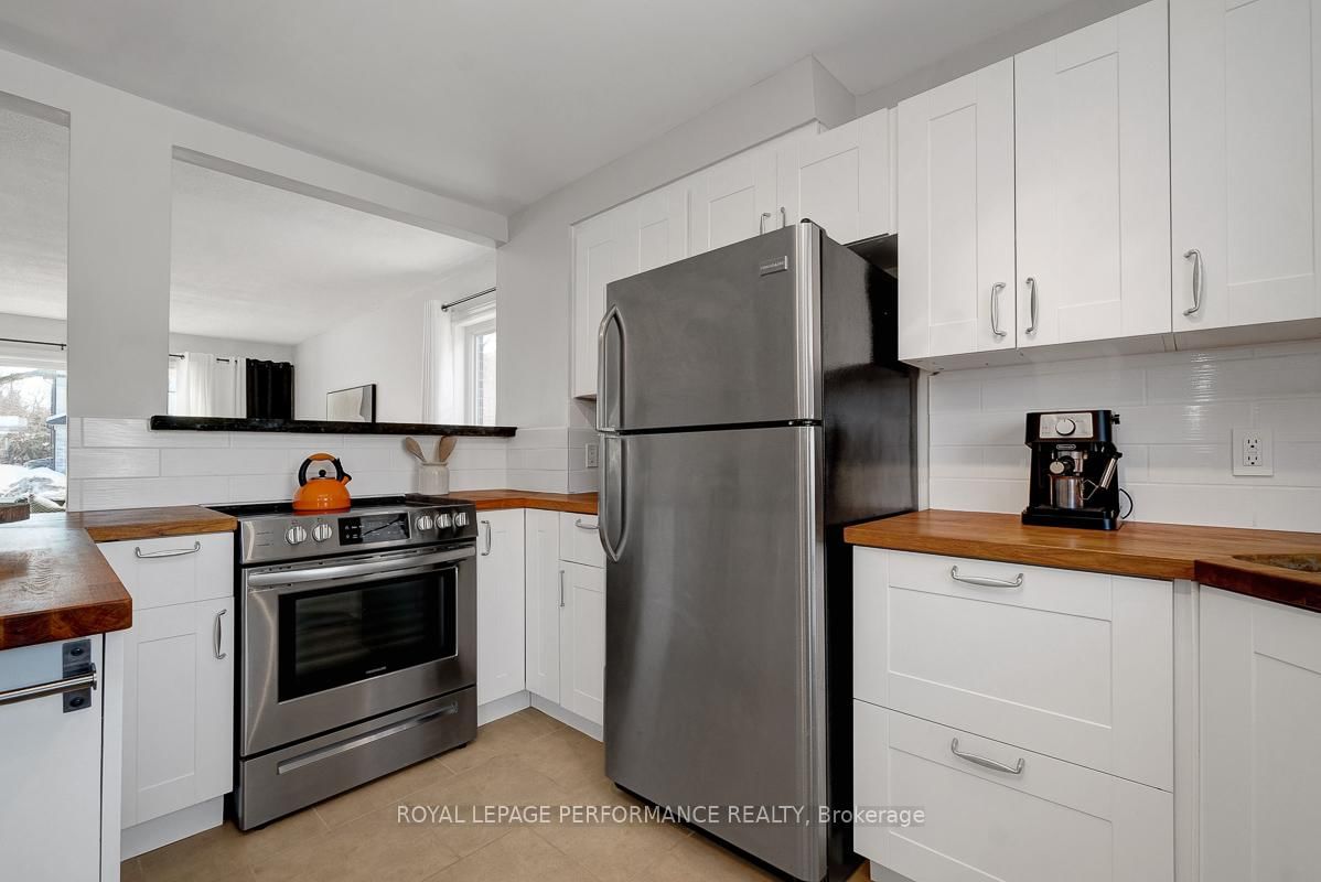 Semi-Detached House for sale at 321 Donald Street, Ottawa, Ontario, K1K 1M4 - Overbrook/Castle Heights - MLS: X12850072