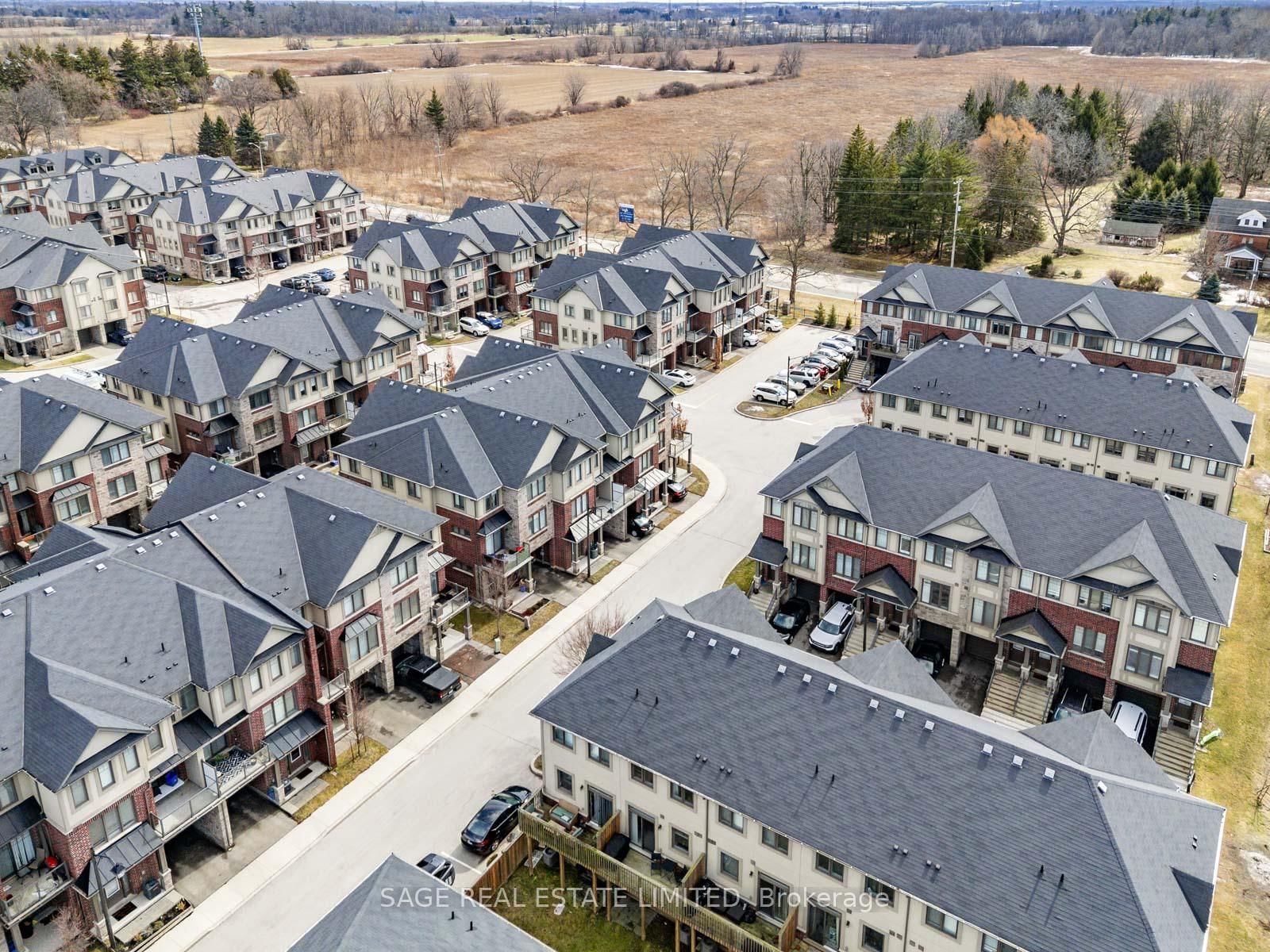 Townhouse for sale at 4 Could Lane, Hamilton, Ontario, L9G 0H2 - Ancaster - MLS: X12865324