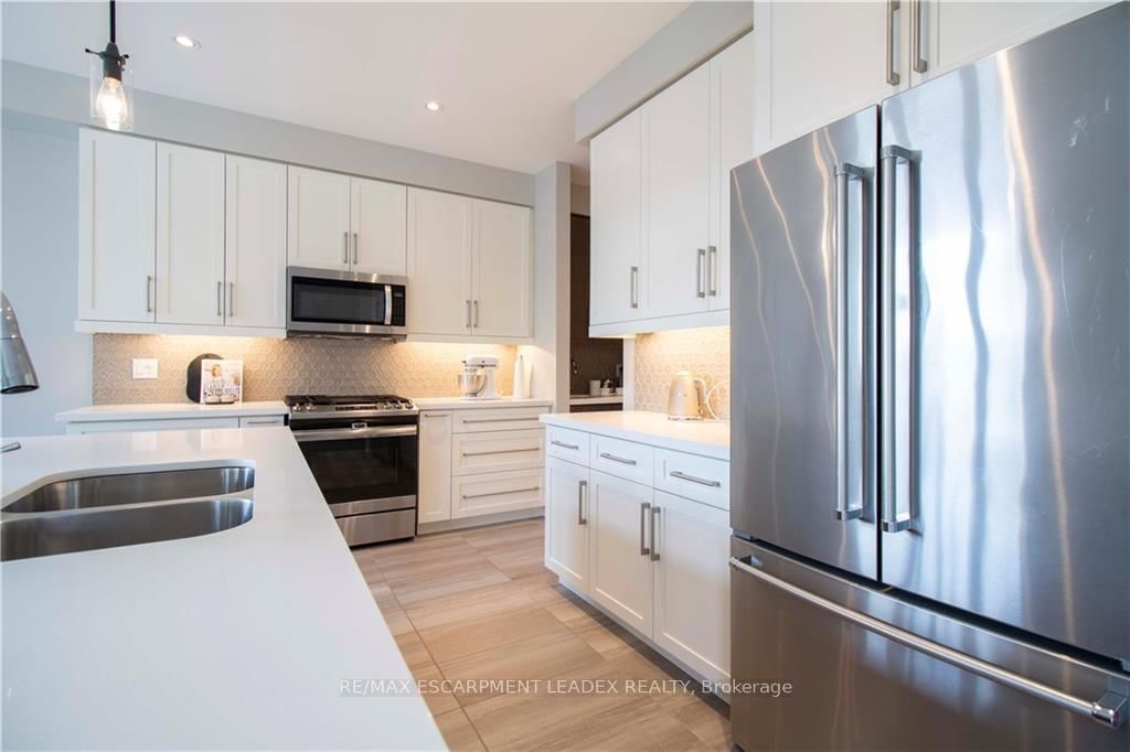 Detached House for sale at 19 SECINARO Avenue, Hamilton, Ontario, L9G 0C6 - Meadowlands - MLS: X12870714