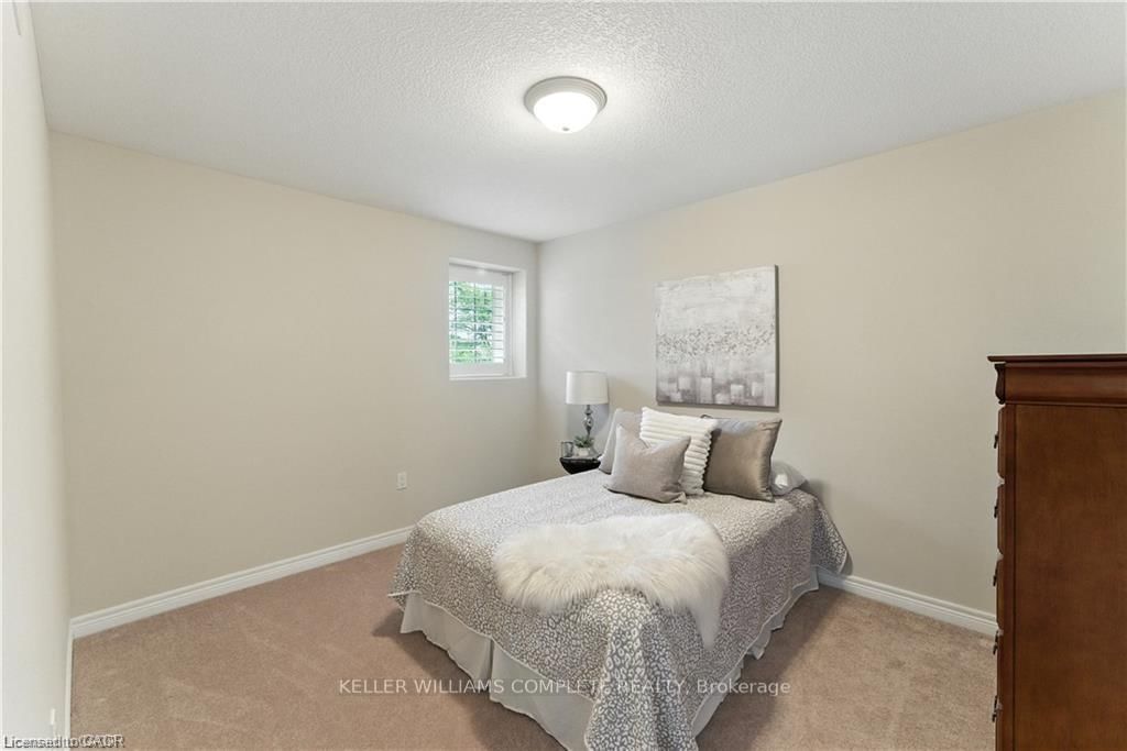 Townhouse for sale at 100 Fall Fair Way, Hamilton, Ontario, L0R 1C0 - Binbrook - MLS: X12892278