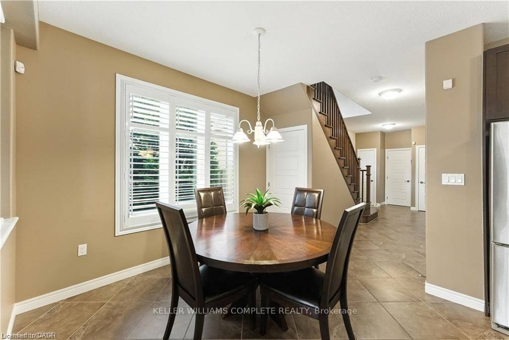 Townhouse for sale at 100 Fall Fair Way, Hamilton, Ontario, L0R 1C0 - Binbrook - MLS: X12892278