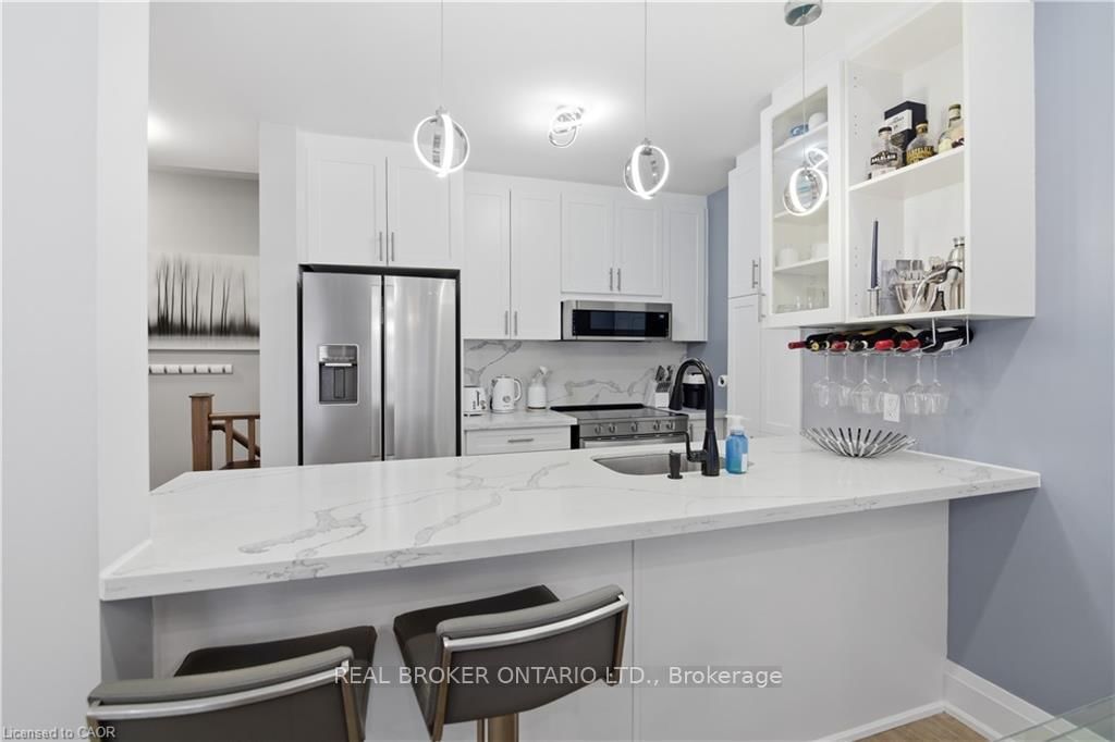 Townhouse for sale at 312 Humphrey Street, Hamilton, Ontario, L0R 2H1 - Waterdown - MLS: X12916600