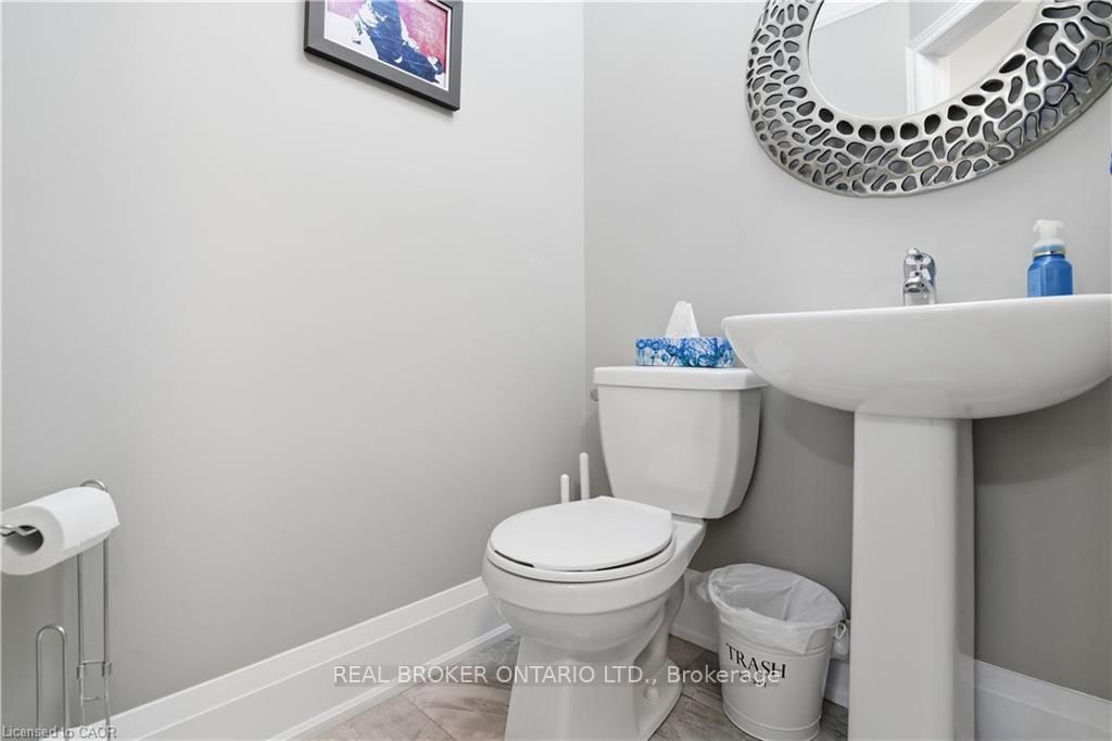 Townhouse for sale at 312 Humphrey Street, Hamilton, Ontario, L0R 2H1 - Waterdown - MLS: X12916600