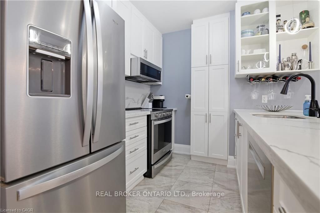 Townhouse for sale at 312 Humphrey Street, Hamilton, Ontario, L0R 2H1 - Waterdown - MLS: X12916600