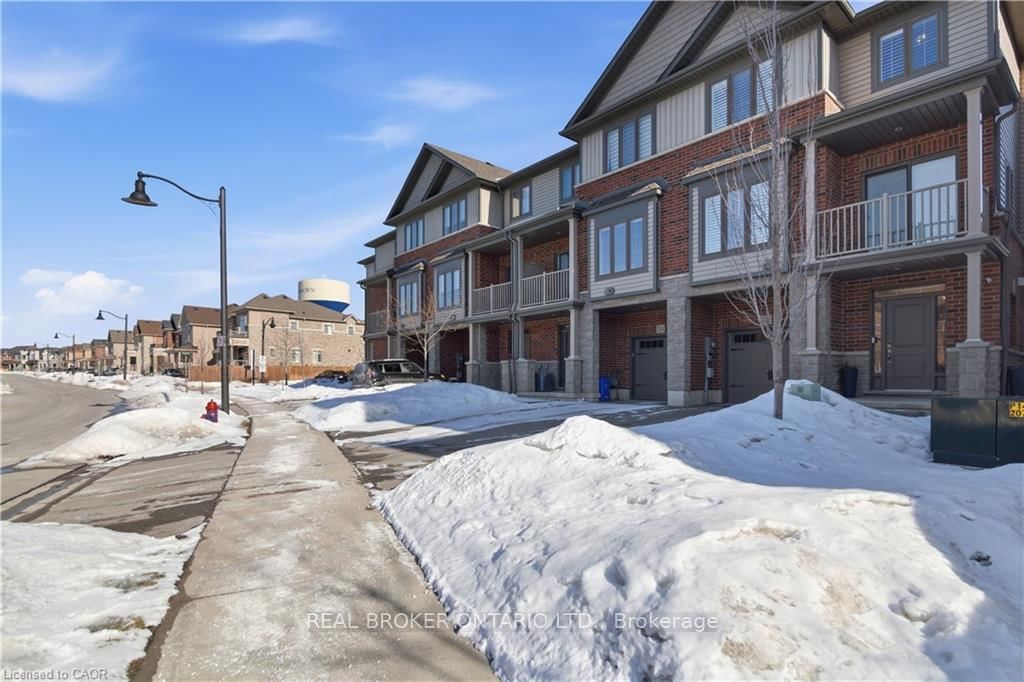Townhouse for sale at 312 Humphrey Street, Hamilton, Ontario, L0R 2H1 - Waterdown - MLS: X12916600