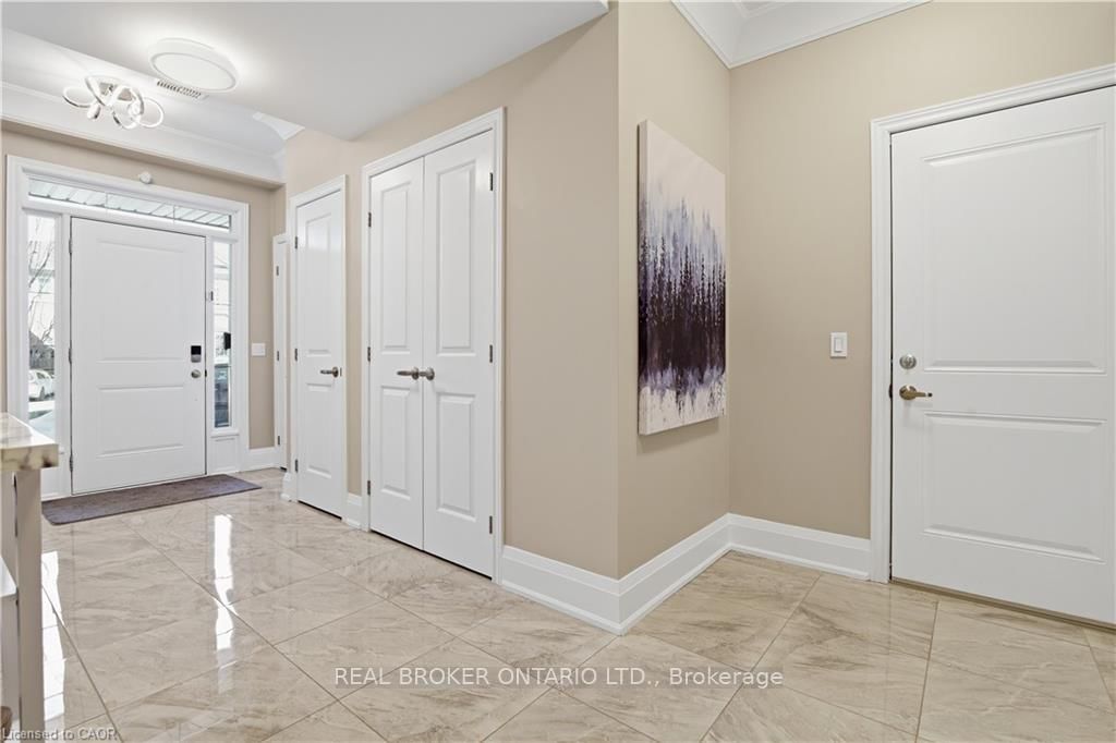 Townhouse for sale at 312 Humphrey Street, Hamilton, Ontario, L0R 2H1 - Waterdown - MLS: X12916600