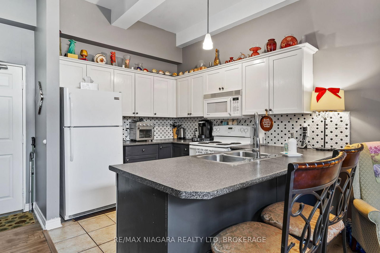 6365 Drummond Road, Unit 103 - Photo 5