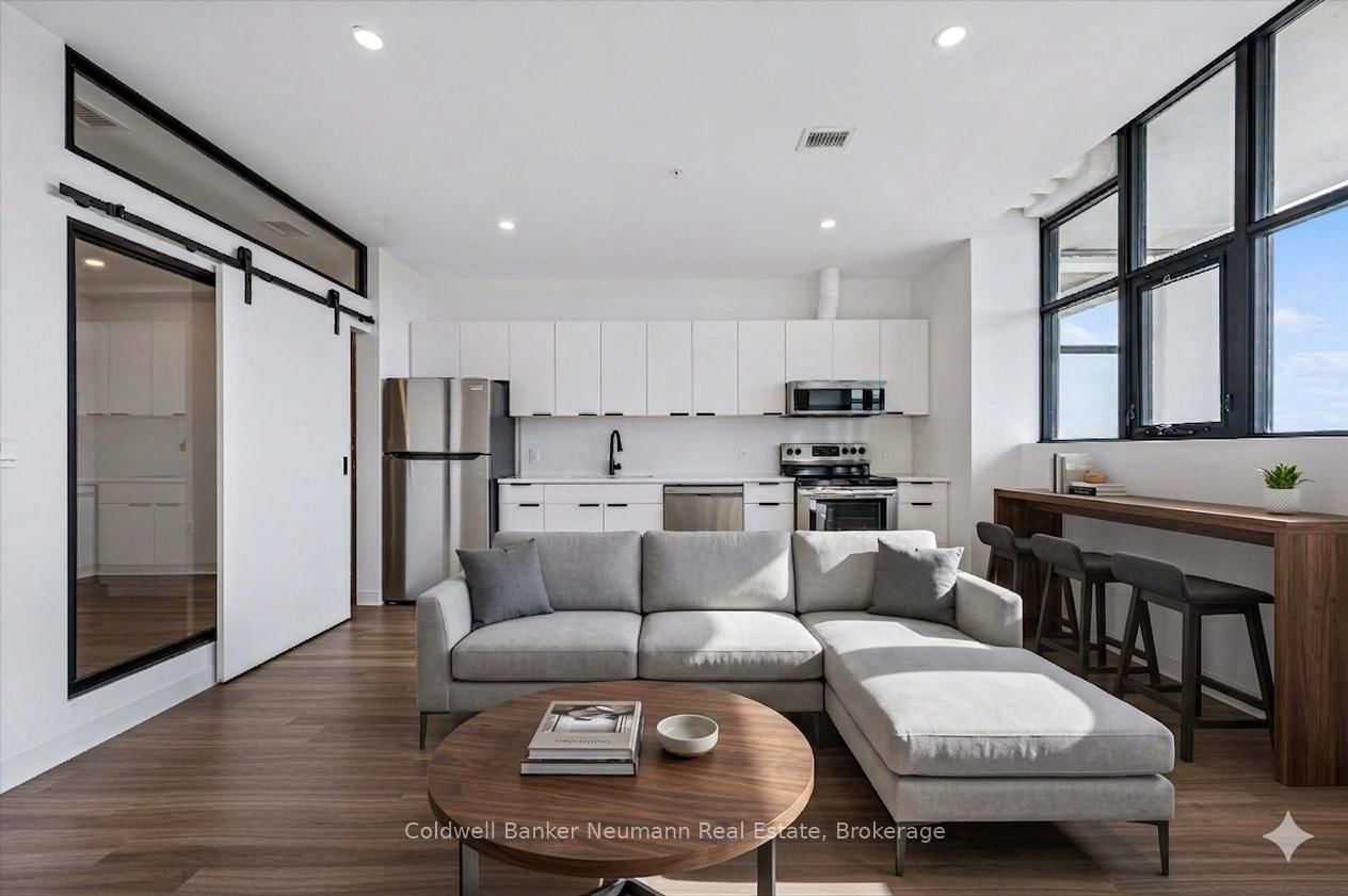 Now available! This stunning one-bedroom, one-bathroom suite is located on the third floor of the highly desirable Alice Block. Only two years old and impeccably maintained, this building offers an array of modern amenities just a short stroll from downtown, the river, and scenic trails. The unit features a bright, open-concept kitchen and living area that flows seamlessly onto the largest open balcony in the entire building. Thanks to its prime south-facing position, the space is flooded with natural light throughout the day. This rental comes complete with convenient in-suite laundry, a dedicated storage locker, parking for one vehicle, and indoor bike storage, offering the perfect blend of style and convenience in a vibrant neighbourhood. Internet is included, while utilities are additional. Residents can enjoy a spectacular rooftop terrace this summer, along with an in-house gym, games room, jam room, and a gorgeous common area for gatherings with friends.