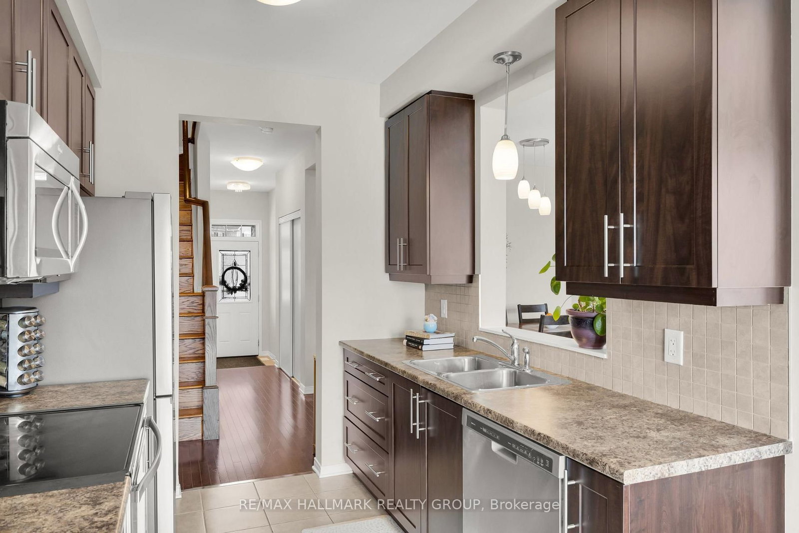 Townhouse for sale at 132 LARAMIE Crescent, Ottawa, Ontario, K2J 5Z8 - Barrhaven - Stonebridge - MLS: X12959784