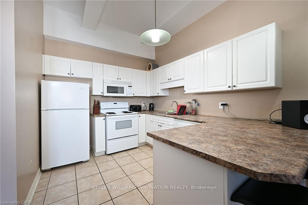 6365 Drummond Road, Unit 105 - Photo 6