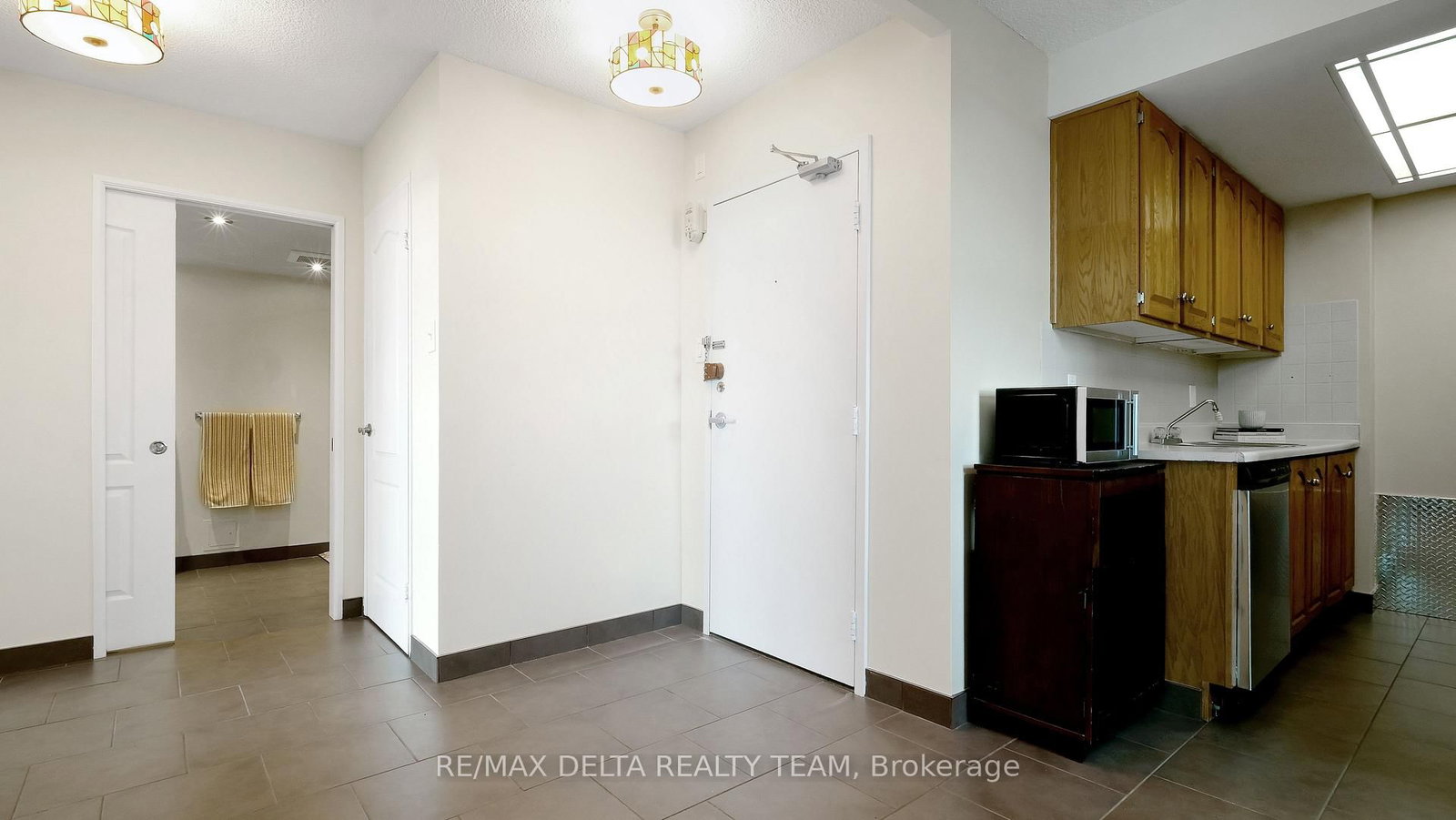 555 Brittany Drive, Unit 1001 - Photo 4
